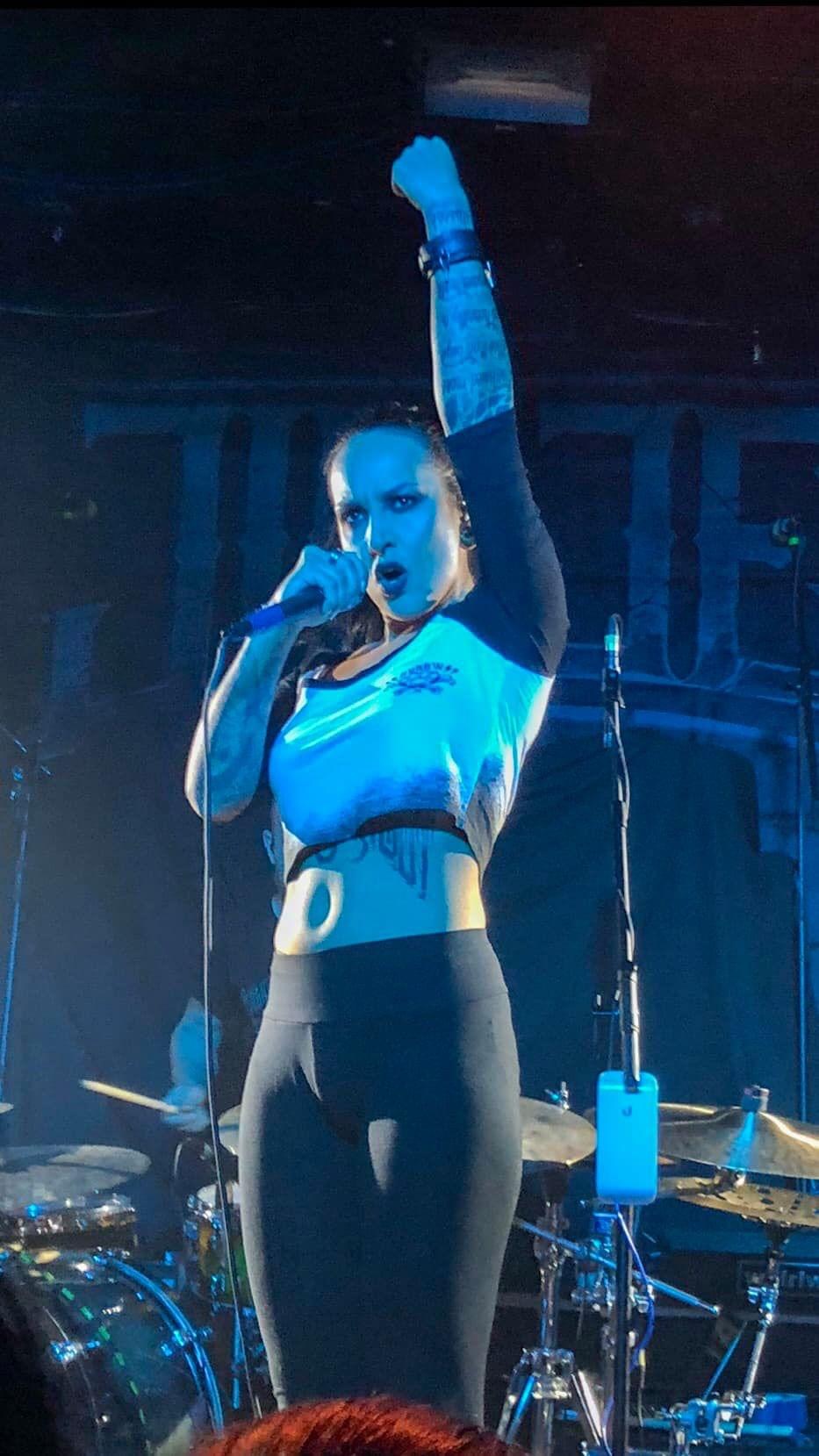 Tatiana Shmailyuk of Jinjer, fist raised, Scout Bar 2018.